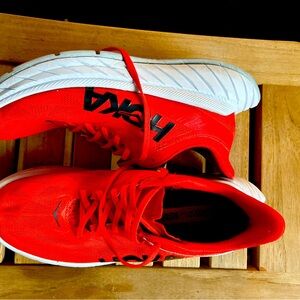 Hoka Men’s red running shoes.  Good condition, - size 8.